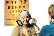 An Optometrist examines a low vision patient